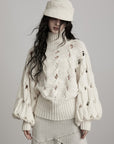 DOINDULGE Braided Void Turtleneck Sweater