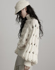 DOINDULGE Braided Void Turtleneck Sweater