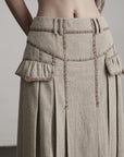 DOINDULGE Herringbone Pleated Maxi Skirt