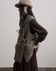 DOINDULGE Textured Wool Vest with Asymmetric Panels and Hand-Tied Toggle Details