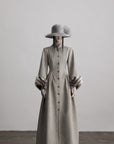 DOINDULGE Sculptural Long Coat with Faux-Fur Cuffs