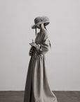 DOINDULGE Sculptural Long Coat with Faux-Fur Cuffs