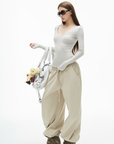 IAMXIAA フィットしたVネック長袖トップ