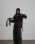 DOINDULGE Sculptural Ribbon Sleeve High Neck Shirt
