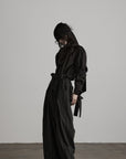 DOINDULGE Sculptural Ribbon Sleeve High Neck Shirt