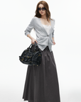 IAMXIAA High-Rise Gathered Maxi Skirt with Raw Hem Detail