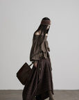 DOINDULGE Shadow Stripe Asymmetric Draped Skirt with Raw Braided Details