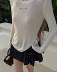 Rase le sol ロゴプリントシアーロングスリーブTシャツ