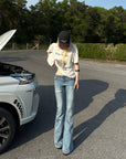Rase le sol Distressed Flared Jeans