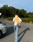 Rase le sol Distressed Flared Jeans