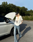 Rase le sol Distressed Flared Jeans