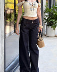 Hydrae Pantalon en jean large taille basse brodé