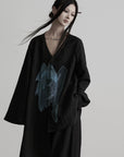 DOINDULGE Asymmetric V-Neck Printed Shirt