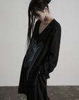 DOINDULGE Asymmetric V-Neck Printed Shirt
