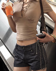Hydrae Lace-Up Polo Collar Short Sleeve Slim Fit Top