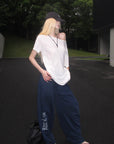Rase le sol Asymmetric Drape Off-Shoulder Top