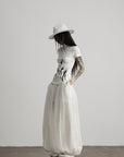 DOINDULGE Low-Rise Sheer Gathered Wide-Leg Pants