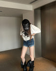 Rase le sol Distressed Denim Mini Shorts with Back Graphic Print and Raw Hem Detail