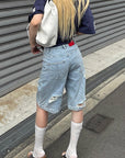 Rase le sol Low-Rise Asymmetric Waist Distressed Denim Pants