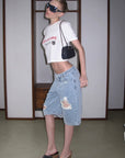 Rase le sol Low-Rise Asymmetric Waist Distressed Denim Pants