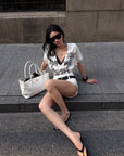 ROVENTE Layered Lace Bralette and Deep V Draped Graphic Tee Two-Piece Set