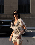 ROVENTE Layered Lace Bralette and Deep V Draped Graphic Tee Two-Piece Set