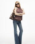 IAMXIAA Low-Rise Eyelet Pocket Distressed Flared Denim Jeans with Vintage Wash