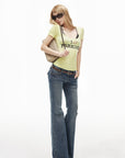 IAMXIAA Low-Rise Eyelet Pocket Distressed Flared Denim Jeans with Vintage Wash