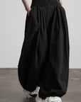 DOINDULGE Low-Rise Pleated Wide-Leg Balloon Pants