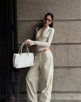 ROVENTE Draped Plunge Corset Long Sleeve Top