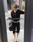 ROVENTE Relaxed Cropped Cargo Pants with Adjustable Drawstring Hem and Utility Pocket Design
