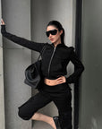 ROVENTE Relaxed Cropped Cargo Pants with Adjustable Drawstring Hem and Utility Pocket Design