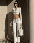 ROVENTE Low-Rise Slim Fit White Denim Flare Jeans