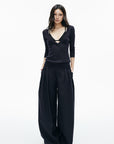 IAMXIAA Deep V-Neck Sheer Knit Sweater