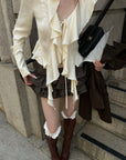 Rase le sol Ivory Ruffled Tie-Front Asymmetric Blouse