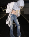 Rase le sol Distressed Low-Rise Washed Flared Denim Jeans