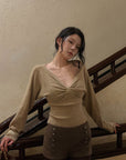 Hydrae Twist-Front Deep V-Neck Knit Top