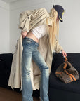 Rase le sol Distressed Low-Rise Washed Flared Denim Jeans