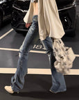 Rase le sol Distressed Low-Rise Washed Flared Denim Jeans
