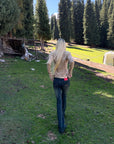 Rase le sol Faded Flared Denim Pants with Copper-Tone Rivets & Embroidered Back Pockets
