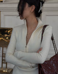 Hydrae Fitted Half-Zip Knit Top with Thumbholes