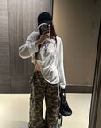 Rase le sol Amor Fati Cross-Embroidered Asymmetric Draped Long Sleeve Top