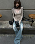 Rase le sol Distressed Low-Rise Flared Denim Pants