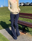 Rase le sol Sculpted V-Neck Cable Knit Top