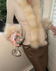 Hydrae Haut cardigan ajusté en maille côtelée avec garniture en peluche
