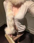 Hydrae Haut cardigan ajusté en maille côtelée avec garniture en peluche