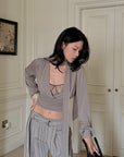 Hydrae Draped Wrap Front Ruched Long Sleeve Top With Asymmetric Neckline