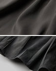 DOINDULGE Asymmetric Smocked Maxi Skirt