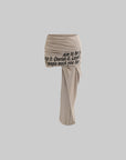 WARDEN EDGE Asymmetrical Text Print Skirt - PINKPARKS