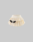 Rase le sol Cream Layered Ruffle Bubble Mini Skirt With Cross-Wing Appliqué
